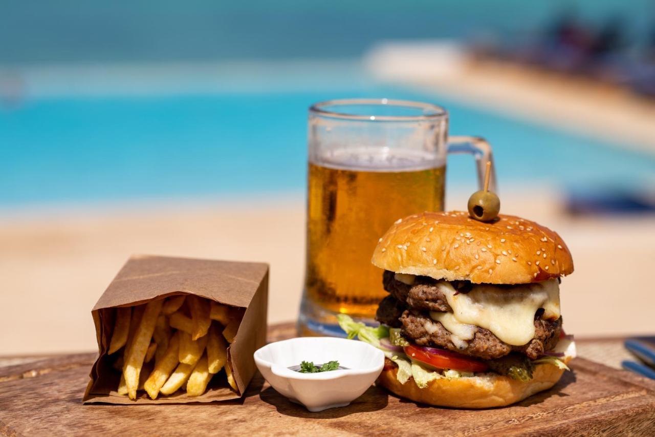 Hotel Nungwi Dreams By Mantis Zewnętrze zdjęcie A cheeseburger with chips and a beer