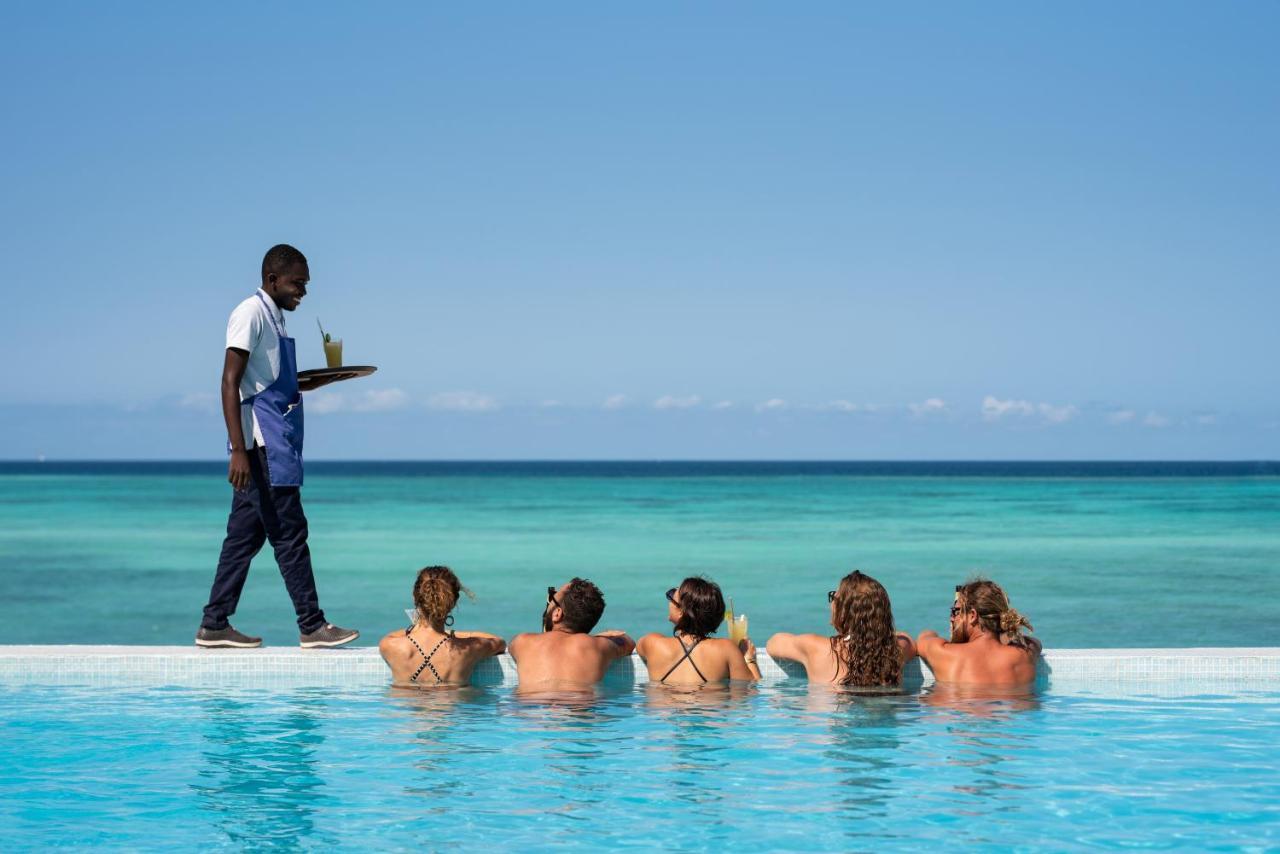Hotel Nungwi Dreams By Mantis Zewnętrze zdjęcie A butler serving drinks at Sandals Resorts